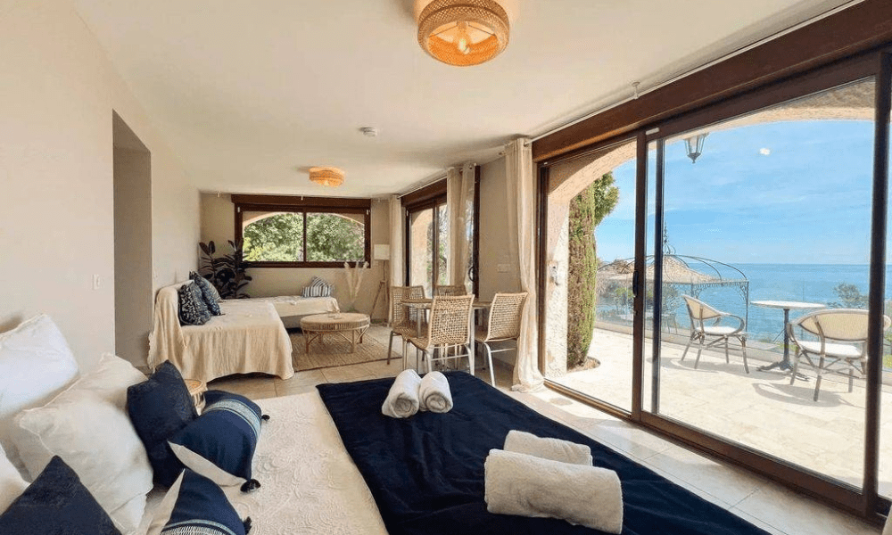 Modern living room interior with ocean vista